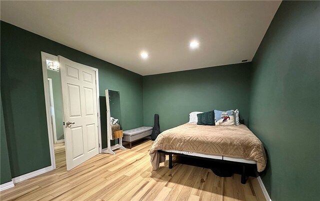 bedroom featuring light hardwood / wood-style flooring