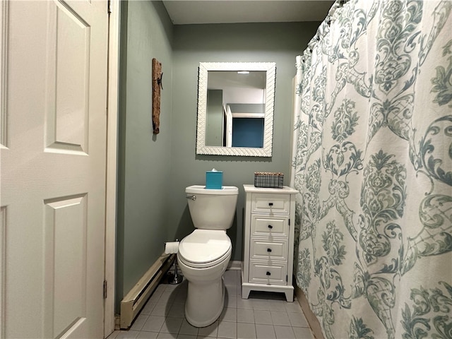 bathroom featuring tile patterned floors, toilet, and a baseboard radiator