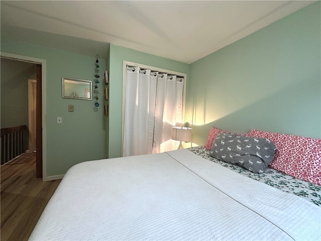 bedroom featuring hardwood / wood-style floors