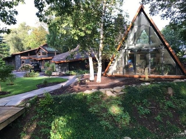 back of house with a yard