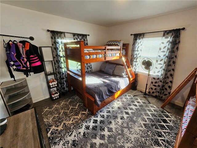 bedroom with wood-type flooring