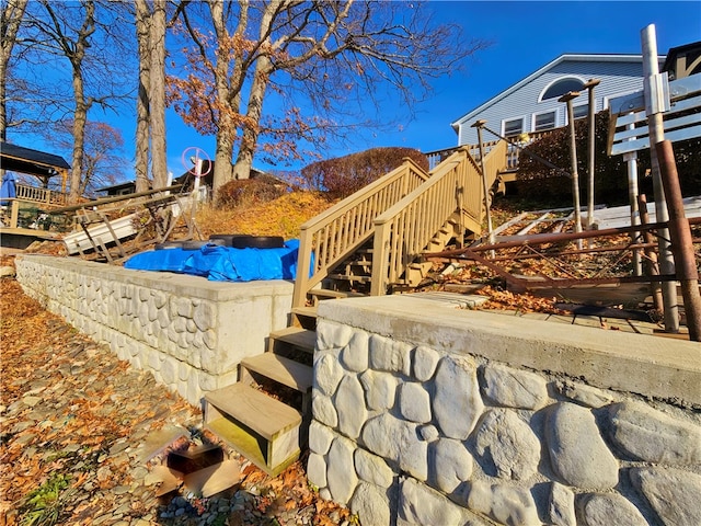 view of swimming pool with a deck