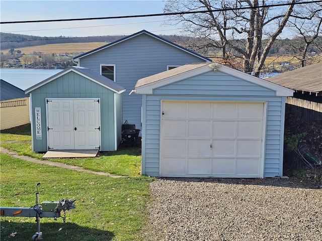 garage with a lawn