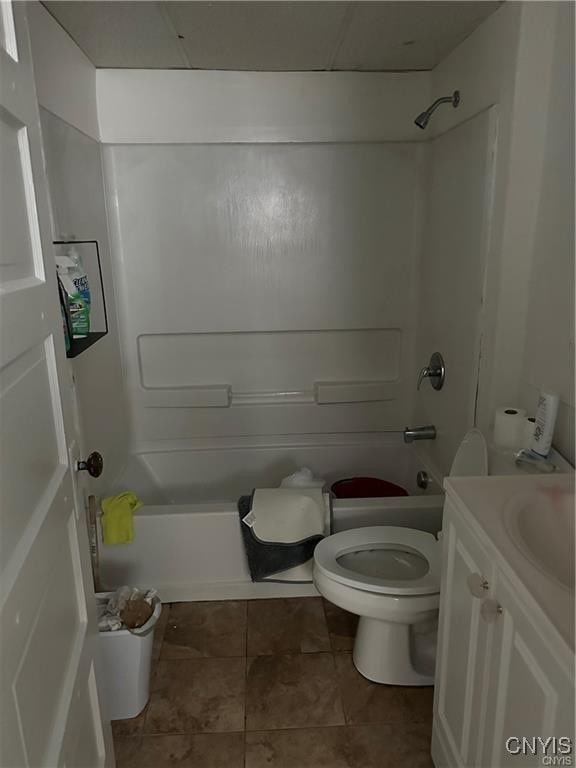 full bathroom with tile patterned flooring, vanity, toilet, and washtub / shower combination