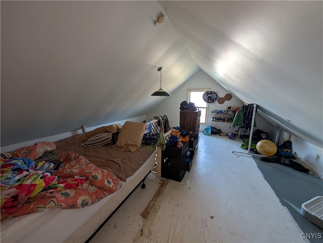 bedroom with lofted ceiling