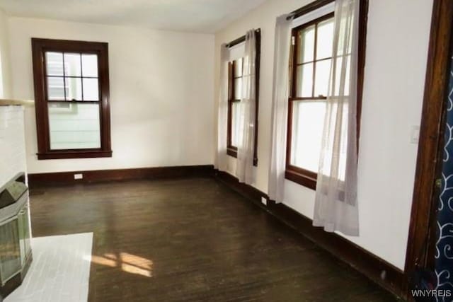 empty room featuring dark hardwood / wood-style floors