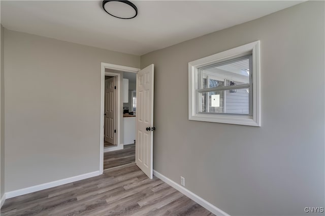 corridor featuring light hardwood / wood-style flooring