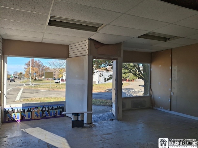 exterior space featuring a drop ceiling