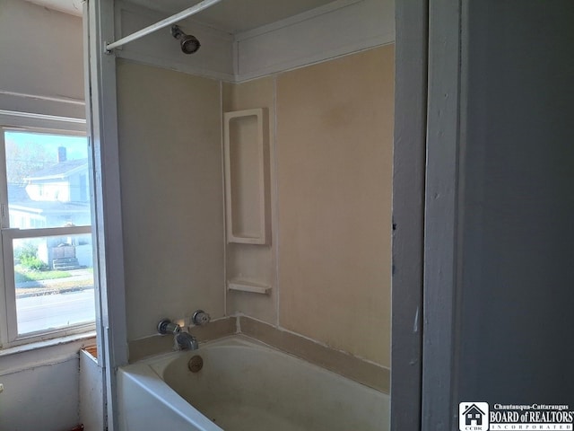 bathroom with shower / bath combination