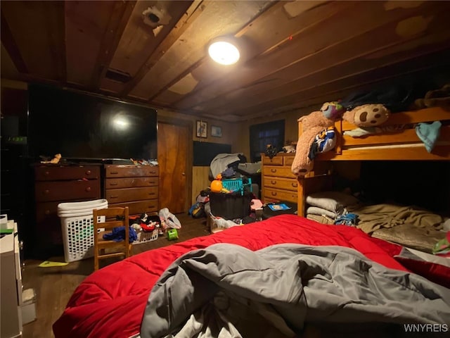 bedroom with wood-type flooring