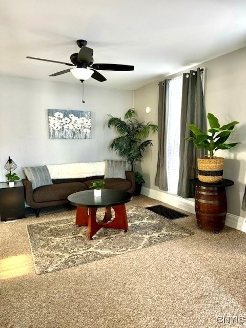 living room featuring ceiling fan