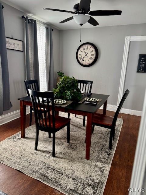 dining area featuring ceiling fan and hardwood / wood-style floors