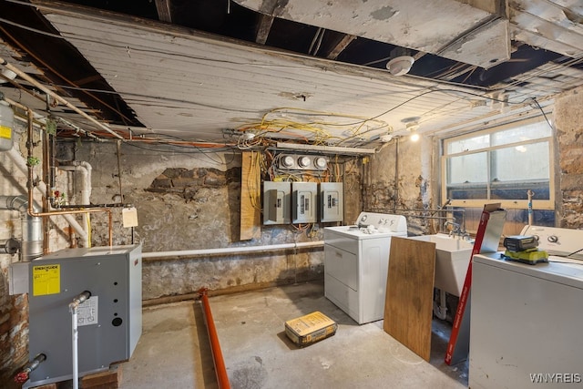 basement with separate washer and dryer and electric panel