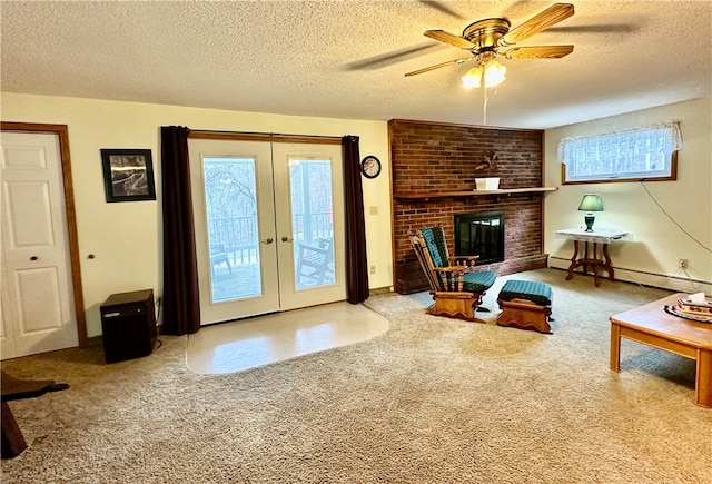 living room featuring light carpet, a baseboard heating unit, french doors, a fireplace, and a textured ceiling