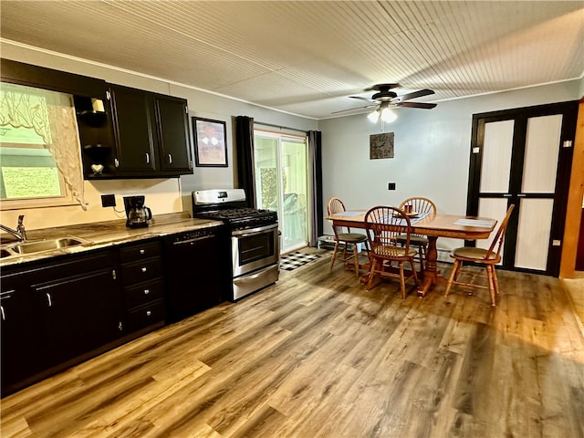 kitchen with ceiling fan, sink, light wood-type flooring, black dishwasher, and gas stove