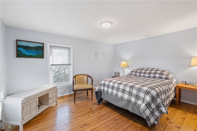 bedroom with light hardwood / wood-style floors