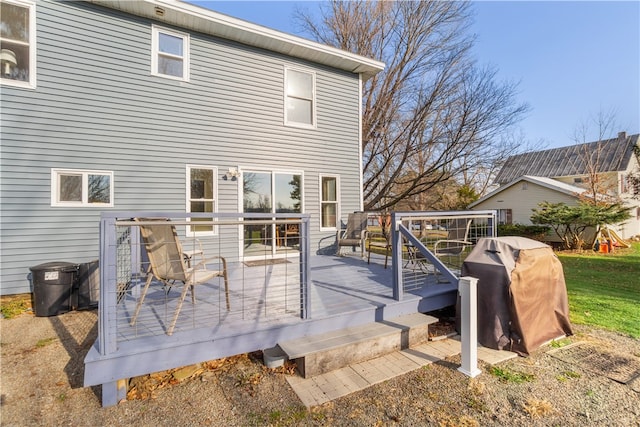 back of property with a wooden deck