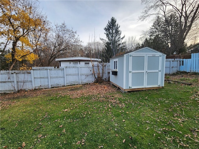 view of outbuilding featuring a lawn