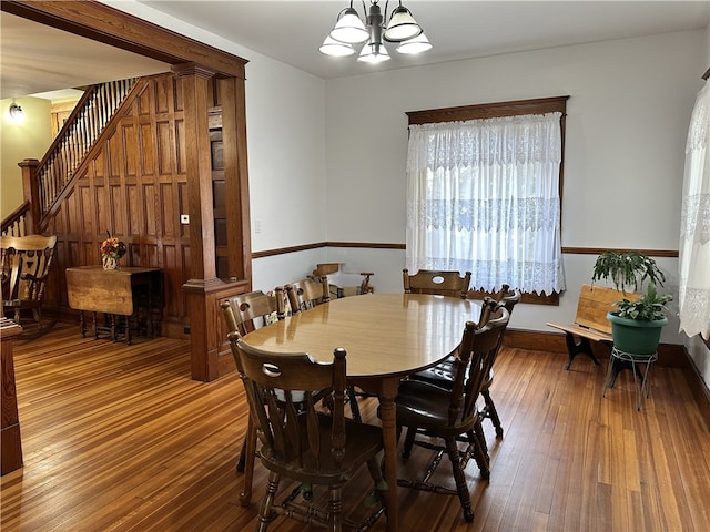 dining room featuring a chandelier and hardwood / wood-style flooring