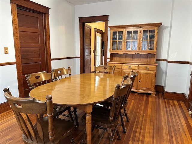 dining room featuring dark wood-type flooring