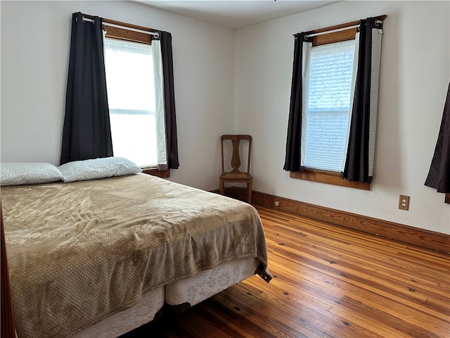 bedroom featuring hardwood / wood-style flooring