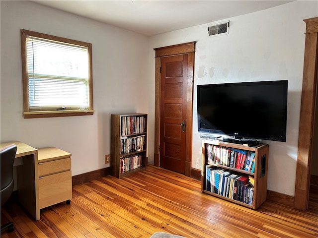 home office featuring light hardwood / wood-style floors