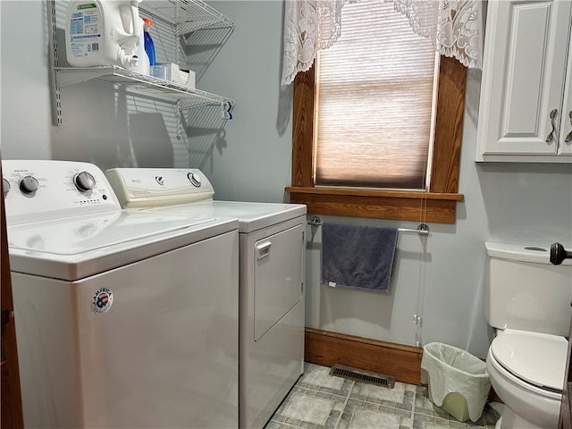 laundry area with washer and dryer