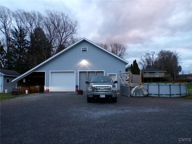 view of property exterior featuring a garage