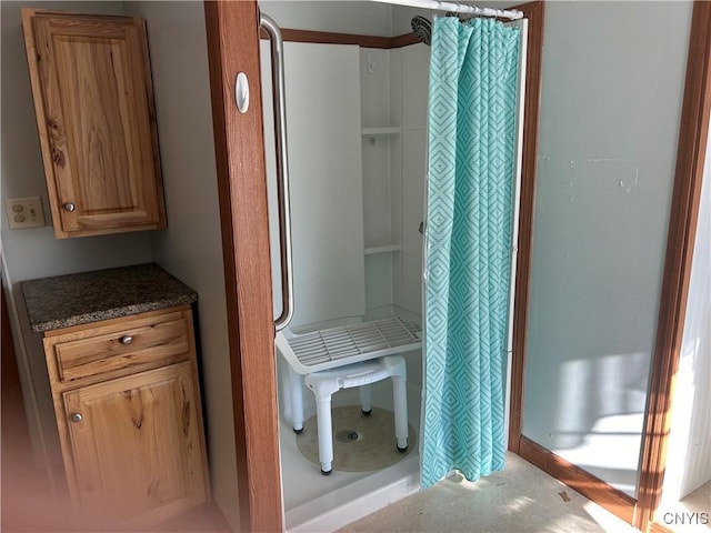 bathroom featuring a shower with curtain