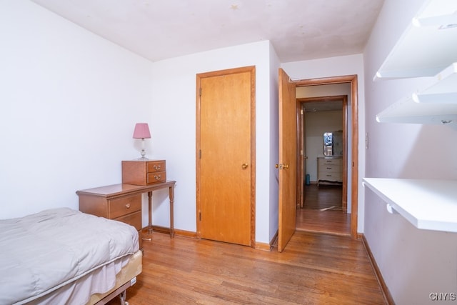 bedroom featuring light hardwood / wood-style flooring