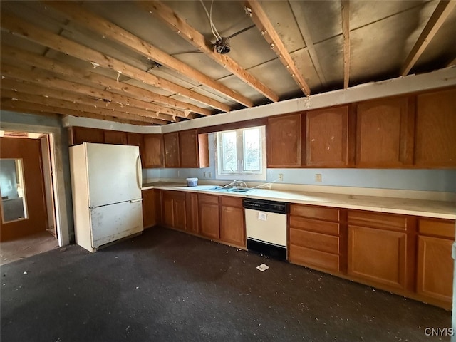 kitchen featuring white appliances and sink