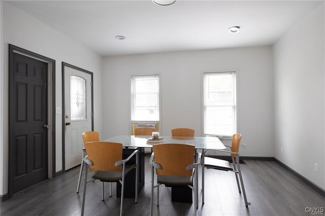 dining room featuring dark hardwood / wood-style flooring