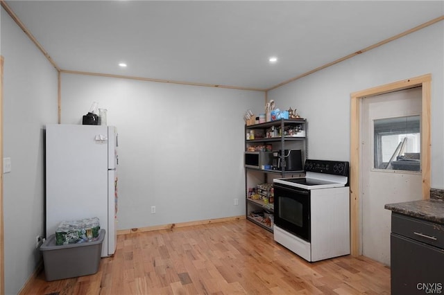 kitchen featuring crown molding, light hardwood / wood-style floors, and white appliances