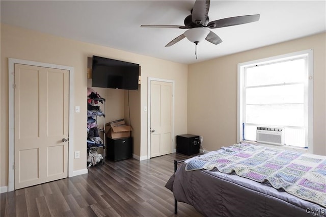 bedroom featuring ceiling fan, cooling unit, and dark hardwood / wood-style flooring