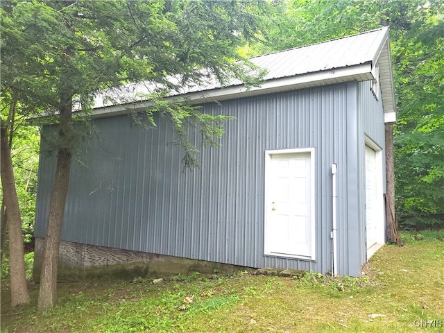 view of outbuilding featuring a garage