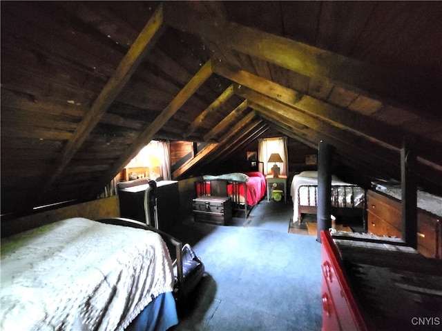 bedroom with lofted ceiling