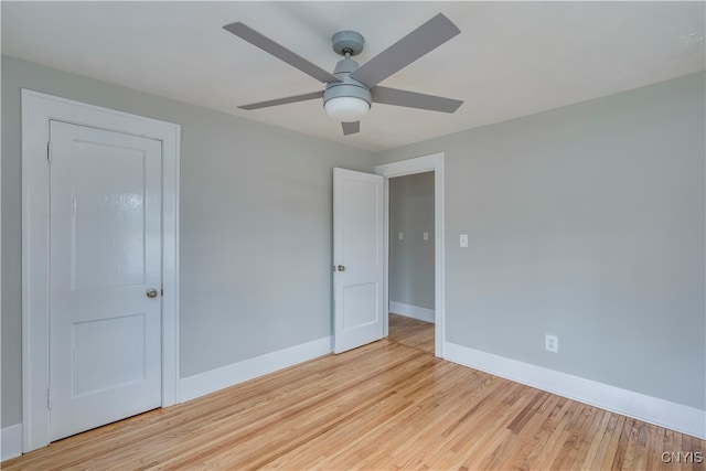 unfurnished bedroom featuring ceiling fan and light hardwood / wood-style flooring