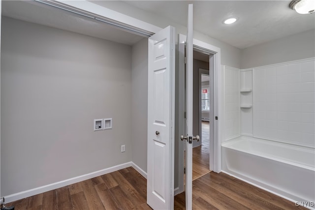 bathroom with wood-type flooring