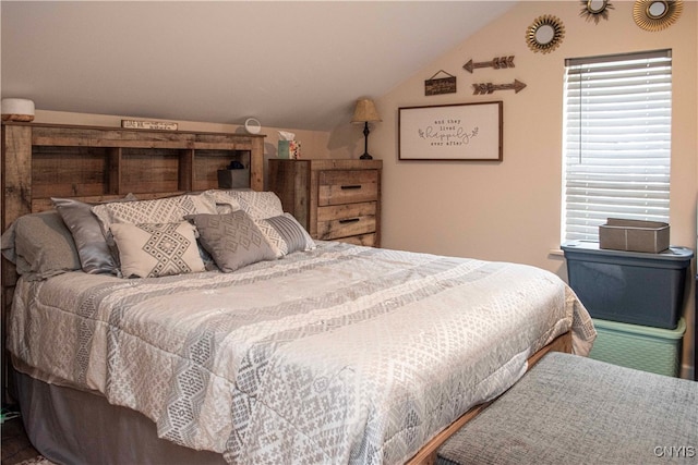 bedroom with vaulted ceiling