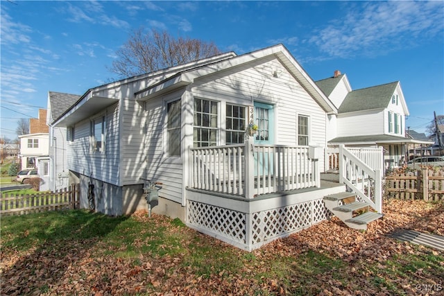 back of property with a deck