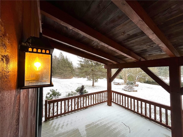 view of snow covered deck