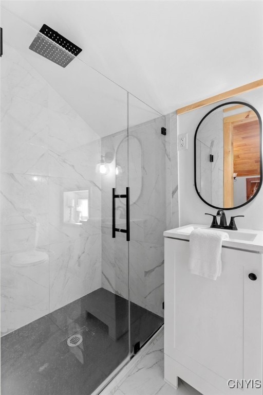 bathroom with vanity and walk in shower