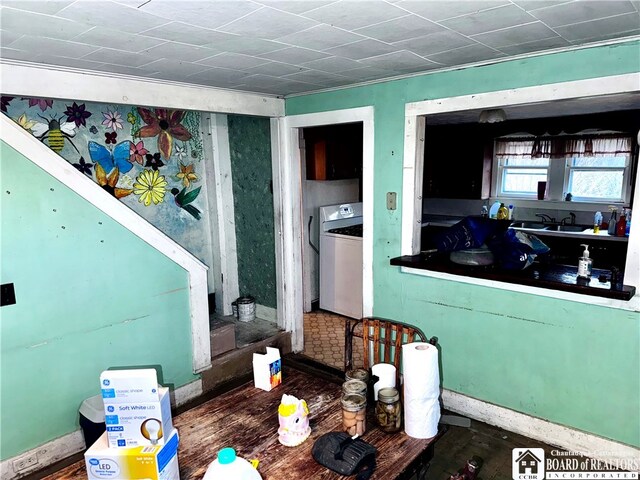 9481 Lamberton Rd, Pomfret, NY 14063 - interior space featuring hardwood / wood-style floors, washer / dryer, and sink