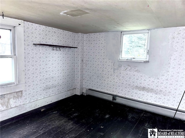 9481 Lamberton Rd, Pomfret, NY 14063 - unfurnished room with a healthy amount of sunlight, wood-type flooring, and lofted ceiling