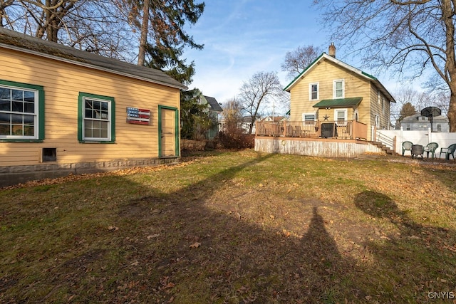 view of yard featuring a wooden deck