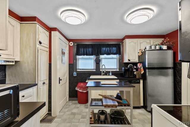 kitchen featuring sink and appliances with stainless steel finishes