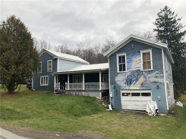 view of front facade featuring covered porch, a garage, and a front lawn