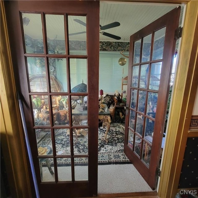 doorway to outside featuring french doors, plenty of natural light, and ceiling fan