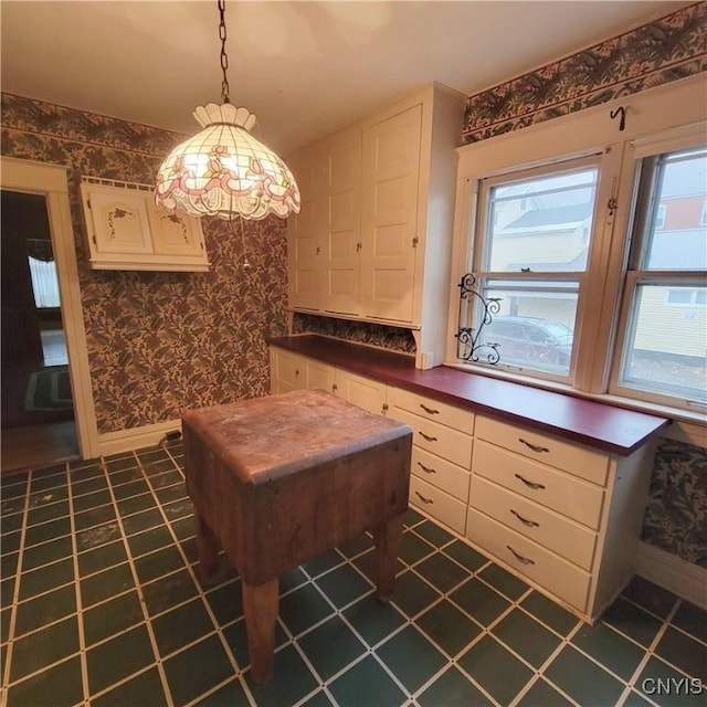 interior space featuring dark tile patterned floors