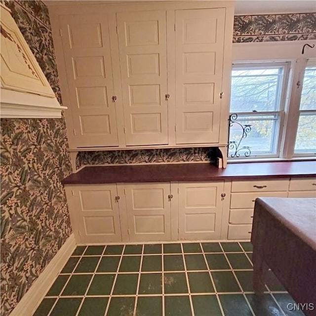 kitchen with white cabinets